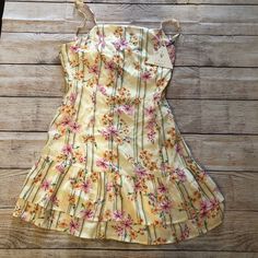 Bloom Baby Mini Dress New With Tags Yellow Floral Print Flower Dress Casual Short, Spring Lemon Print Sundress For Vacation, Yellow Mini Dress For Spring Vacation, Yellow Ruffled Sundress For Summer, Casual Lemon Print Sundress For Beach, Yellow Casual Sundress With Ruffles, Cute Yellow Dress For Garden Party, Casual Yellow Ruffled Sundress, Casual Yellow Sundress With Ruffles