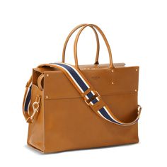 An expanded version of our bestselling Day Satchel, the Large Satchel is a versatile on-the-go bag that can handle the day’s work and tonight’s play, all at once. | Shinola Women's Large Satchel Bag in Tan Natural Leather Timeless Tan Satchel With Gold-tone Hardware, High-end Tan Satchel For Daily Use, Classic Tan Satchel With Gold-tone Hardware, Tan Top Handle Satchel For On-the-go, Tan Shoulder Satchel With Gold-tone Hardware, Go Bags, Leather Conditioner, Natural Tan, Satchel Bag