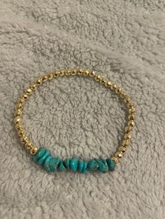 Handmade beaded bracelet with genuine turquoise chip stone beads and 4mm facated 14k gold plated ball beads on a stretch chord Gold Beaded Bracelet, Turquoise And Gold, Gold Bead Bracelets, Bracelets Handmade Beaded, Genuine Turquoise, Turquoise Stone, Gold Beads, Stone Beads, Beaded Bracelet