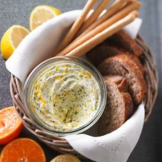 a basket filled with bread and orange slices