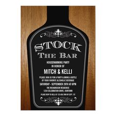 a bottle of liquor on top of a wooden table with the words stock the bar