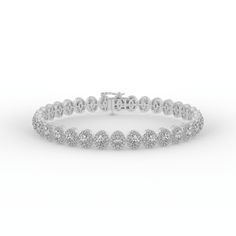 Introducing our exquisite Diamond Tennis Bracelet, a radiant embodiment of timeless elegance and sophistication. This bracelet is a harmonious fusion of classic design and brilliant craftsmanship, meticulously created to adorn your wrist with captivating beauty. At the heart of this stunning piece are scintillating diamonds, each expertly selected for its exceptional quality and dazzling brilliance. These diamonds are meticulously set in a continuous, unbroken line, showcasing their fire and spa Elegant Heart-shaped Tennis Bracelet With Diamond Accents, Elegant Multi-stone Oval Tennis Bracelet, Heart-shaped Cubic Zirconia Tennis Bracelet With Diamond Accents, Luxury Diamond Tennis Bracelet, Flexible, Luxury Hand-set Cubic Zirconia Tennis Bracelet, Tennis Bracelet Diamond, Rose Gold Metal, Tennis Bracelet, Perfect Ring