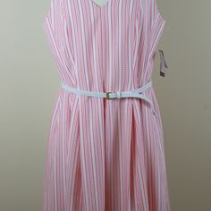 Cute Summer Dress By Nine West In Size 12. Style Is Called Modern Escape. Color Is Coral Lily. White Belt Included. Fully Lined. V Neck In Front And Back. Pleats At Waist For Full Skirt. Invisible Back Zipper. Dry Clean. 76% Polyester, 24% Cotton. Length: 39" Armhole To Armhole Flat: 20" Pink Summer Midi Sleeveless Dress, Pink Sleeveless Midi Length Summer Dress, Pink A-line Sundress For Daywear, Casual Lined Pink Sundress, Casual Pink Lined Sundress, Casual Pink Lined Midi Dress, Pink Sleeveless Lined Midi Dress, Pink A-line Sleeveless Lined Dress, Pink Sleeveless Lined Sundress