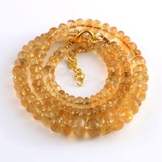 "AAAA++ QUALITY~Natural Citrine Faceted Rondelle Beads High Grade Citrine Gemstone Beads 5-10.MM Citrine Beads Necklace Sparkling Citrine. Gemstone Type :  Natural ( Untreated& Unheated) Item Code        :   9303 Origin               -: Natural Citrine Necklace Grade                -:  AAAA++ Stone shape     -: Rondelle Faceted beads Stone color       -:  Yellow Color Metal-: Length                -: 16 Inch Quantity             -: 1 Strand Approx Weight   : 158.40 Carat    Size-:                       5 To 10 MM 100% Genuine & Natural ABOUT US skgemsstone based in Jaipur, India is a company engaged in supplier, manufacturing, wholesale and retail business of Gemstones ( semi precious stones and precious stones ) Faceted and cabochon. We look forward for an opportunity from you, to supply Citrine Gemstone Round Beads Jewelry, Citrine Faceted Round Beads Jewelry, Faceted Citrine Beads Jewelry, Citrine Jewelry With Faceted Round Beads, Amber Citrine Beaded Necklace, Citrine Gemstone Beads For Jewelry Making, Yellow Gemstone Beaded Necklaces With Round Beads, Citrine Beads, Citrine Necklace