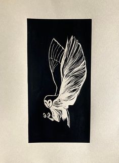 a black and white drawing of a bird flying