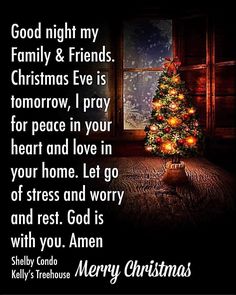 a christmas tree in front of a window with the words, good night my family and friends