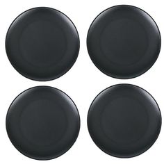 four black plates sitting on top of each other