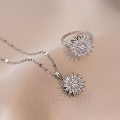 Material: Titanium Steel Fashion Element: Petals Style: Europe and America Seed Jewelry, Sunflower Bracelet, Double Ear Piercings, Flower Choker Necklace, Spinning Ring, Sunflower Necklace, Flower Choker, Sunflower Earrings, Sunflower Painting