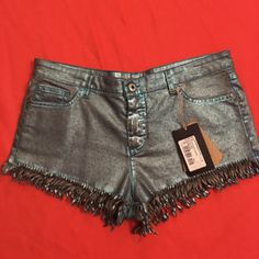 New With Tags Vintage Patrizia Pepe, Metallic Coated Teal Shorts With Fringe With Back Pockets. It Has Some Marks On The Surface But That’s The Style. I Think It Is Called Distressed. Size 28 (M-6). $75. Original Price $130 Fitted Summer Festival Bottoms, Fitted Summer Bottoms For Festival, Fitted Jean Shorts For Party, Trendy Jean Shorts For Party, Casual High-waisted Shorts For Party, High Waist Fitted Jean Shorts For Party, High-waist Fitted Jean Shorts For Party, Summer Party Cutoff Bottoms, Fitted Jean Shorts For Summer Parties