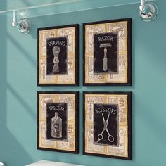 three framed pictures hang on the wall above a toilet with scissors and shaving razors