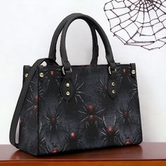 "Scary Black Tarantula Handbag, Dark Goth Witchy Purse, Dark Cottagecore Bag, Organized Goblincore Bag, Vegan Leather Dark Nature Handbag * PU Main material for ladies fashion handbag tote bag * Smooth zipper and all over printing customized style * Main compartment design with two top handles maintains balance * Two Side pockets and with the shoulder strap stitched and immovable * White & Black color for different style with wearing outfits * Great gifts for girls and mom ,also good use for off Gothic Bags With Adjustable Strap For Halloween, Gothic Halloween Shoulder Bag With Adjustable Strap, Gothic Black Bags With Large Capacity, Black Gothic Bag With Large Capacity, Gothic Large Capacity Black Bag, Gothic Large Capacity Shoulder Bag, Black Gothic Tote Shoulder Bag, Black Tote Shoulder Bag For Halloween, Black Gothic Shoulder Bag