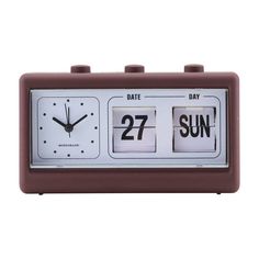 an alarm clock with the date and time displayed