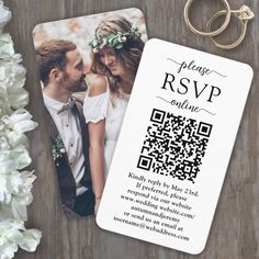 a wedding card with the text please rsvp online on it next to a keychain