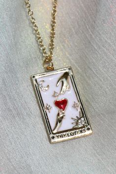 The Lover Tarot Card Necklace Tarot Cards Jewelry, Tarot Card Jewelry, The Lover Tarot, Tarot Jewelry, Expensive Christmas, Tarot Card Necklace, Tarot Card Design, Resort 2017 Fashion, The Lovers Tarot Card