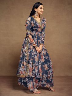 Introducing the stunning "attractive blue floral printed chiffon festival wear palazzo suit" from Ethnic Plus, a must-have addition to your ethnic wear collection. Made from high-quality chiffon material, this suit features intricate floral print, zari work, and sequin work, making it the perfect outfit for festivals, weddings, and other special occasions. The set includes a fully stitched blue palazzo suit with a matching chiffon palazzo and dupatta, all adorned with beautiful floral prints and Floral Print Georgette Sharara For Diwali, Diwali Floral Print Georgette Sharara, Bollywood Style Floral Print Sharara For Eid, Bollywood Floral Sharara For Eid, Festive Floral Print Georgette Sharara, Multicolor Palazzo Set In Georgette With Digital Print, Multicolor Georgette Palazzo Set With Digital Print, Elegant Floral Print Georgette Sharara, Multicolor Digital Print Georgette Palazzo Set