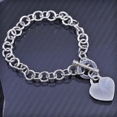 7.25" 8mm, vintage Italian sterling silver 925 bold circle chain bracelet with heart charm and toggle closure, stamped 925 Sterling Silver Charm Bracelet With Toggle Clasp, Sterling Silver Bracelet With Toggle Clasp, Sterling Silver Toggle Clasp Bracelet Gift, Silver Heart-shaped Bracelet With Toggle Clasp, Sterling Silver Bracelet With Toggle Clasp Gift, Sterling Silver Round Bracelet With Toggle Clasp For Gift, Silver Heart Bracelet With Toggle Clasp, Silver Charm Bracelet With Heart Charm, Circle Chain