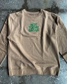 This Not Today Satan Adult Drop Shoulder Sweatshirt is the perfect comfy, cozy addition to your wardrobe! Get comfy and warm in this amazingly soft sweatshirt, making it your go-to for chilled-out days. With its drop shoulder cut, it's sure to make a statement – 'Not Today Satan '!! Drop Shoulder Sweatshirt, Dropped Shoulder Sweatshirt, Not Today, Shoulder Cut, Comfy Cozy, Drop Shoulder, Wardrobe, Sweatshirts