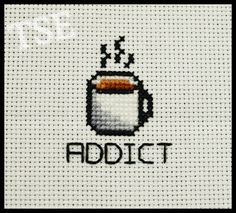 a cross stitch coffee mug with the words, i love adict