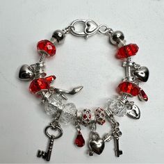 Silver Bracelet Heels And Red Keys Silver Bracelets For Valentine's Day Party, Adjustable Red Charm Bracelet For Party, Adjustable Red Metal Charm Bracelet, Elegant Red Charm Bracelet With Lobster Clasp, Nickel-free Red Metal Bracelets, Red Nickel-free Metal Bracelets, Nickel-free Red Metal Bracelet, Red Nickel-free Metal Bracelet, Sliver Necklace