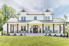 a rendering of a white house with porches and windows