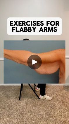 a man standing in front of a sign that says exercises for flabby arms