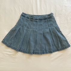 Denim Pleated High Waist Mini Tennis Skirt. Never Worn. Pleated Medium Wash Denim Bottoms, Denim Blue Pleated Denim Skirt, Pleated Denim Skort For Spring, Casual Denim Skort For Day Out, Casual Medium Wash Pleated Denim Skirt, Casual Denim Blue Pleated Mini Skirt, Medium Wash Cotton Pleated Skirt, Casual Pleated Denim Mini Skirt, Blue Denim Pleated Skort