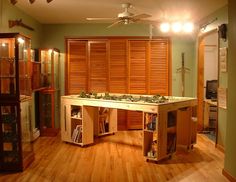 a room with wooden floors and green walls