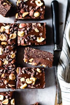 chocolate brownies with nuts are cut into squares