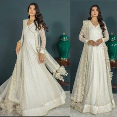 White On Gold Is Always A Win Win!! The Fabric Looks Just As Luxe As It Feels. This Classically Elegant Angrakha In A Luscious Off White Shade Is Layered With A Blissful Composition. It Features A Synthetic Embroidered Chiffon Angrakha With Exquisite Embroidery In Mesmerizing White-Gold Threads At The Front, Sleeves & Dupatta Reflecting A Beautiful Blend Of Grace And Luxury With Dori And Embroidered Tassels At The Neck. Handmade Tassels On The Dupatta Is Giving Gorgeous Aesthetic, And Alluring Look. Wear This Piece On Nikkah, Engagement, Heavy Formal Or Any Festive Occasion! Chest 21 “ Length 60” Embroidered Chiffon, Gold Threads, Long Dress, Tassels, Chiffon, Composition, White Gold, Off White, Festival