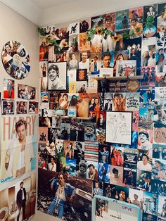 a wall covered in pictures and photos next to a window