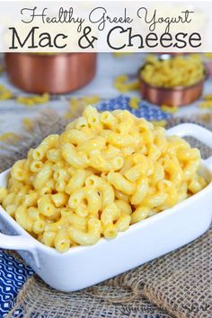 macaroni and cheese in a white dish on top of a table