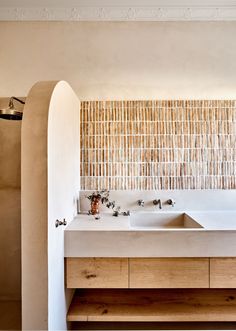 A stunning mix of tile in a warm and contemporary bathroom space.