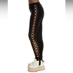 New With Tags, Zero Flaws. The Boxing & Bomber Lacing Tights Bring Sexy And Cool At The Same Time. Featuring A Lace Up Closure On The Sides To Show As Much Side-Legs As You Dare. * Elastic Waistband * Solid Black Colorway * Adjustable Laces On Sides For Custom Fit * Satin Trim Fenty Puma By Rihanna // Boxing Bomber Leggings (Lace Up Pants) Color: Black Size: Xs Offers Always Welcome! Edgy Stretch Bottoms For Workout, Edgy Black Bottoms For Loungewear, Spring Athleisure Bottoms For Night Out, Sporty Spring Activewear For Night Out, Sporty Pants For Spring Night Out, Sporty Pants For Night Out In Spring, Lace Up Pants, Puma X, Fenty Puma