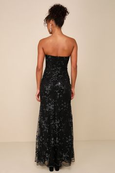 Your entrance will be an iconic statement in the Lulus Confident Sensation Black Sequin Strapless Bustier Maxi Dress! Sparkling black sequins, accented by silver lurex threading, create a floral-inspired design across mesh knit as it falls from a strapless, sweetheart neckline (with hidden no-slip strips). The bustier-style bodice boasts lightly padded cups, underwire support, and hidden side boning. High, fitted waist sits atop a figure-flattering, mermaid maxi skirt with a sultry thigh-high si Black Strapless Evening Dress With Corset Back, Strapless Embellished Sequin Evening Dress, Strapless Evening Dress With Contrast Sequin For Gala, Strapless Sequin Dress For Evening Formal, Formal Strapless Dress With Sequins And Sweetheart Neckline, Glamorous Black Strapless Dress With Corset Back, Strapless Evening Sequin Dress For Gala, Evening Sequin Dress With Corset Back And Sweetheart Neckline, Black Strapless Dress With Corset Back For Gala