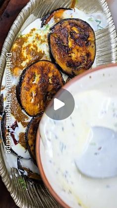 an image of food that is being served on a plate with ranch dressing in the bowl