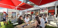 people sitting at tables under red umbrellas in an open area with grass on the ground