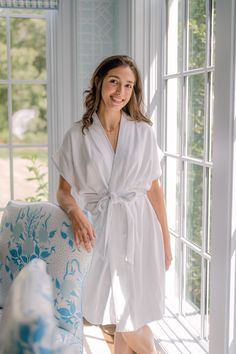 Our Terry Robe is a breezy loungewear essential that combines comfort and style. Crafted from plush cotton terry and trimmed with charming seersucker, this robe is designed to hit above the knee, offering a flattering and versatile silhouette. The cap-sleeve kimono style enhances its lightweight feel, making it ideal for summer or year-round use. Material: Terry CottonSize & Fit: Runs generous, If in between sizes, size down.Care guide: Machine wash cold with like colors. Hang to dry. The model Cozy Relaxed Fit Robe For Loungewear, Cozy Robe With Relaxed Fit For Loungewear, Cozy Cotton Robe For Loungewear, Cozy Relaxed Fit Robe For Lounging, Spring Lounging Robe With Tie Waist, Spring Loungewear Sleepwear With Tie Waist, Spring Relaxation Robe With Tie Waist, Cozy Relaxed Fit Robe For Relaxation, Spring Sleepwear With Tie Waist For Loungewear