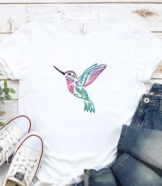 "Cute Colorful Bird Shirt, Vintage Forest Botanical Bird Tee Colorful Birds Shirt, Bird Shirt for Women, Bird Lover Shirt, Animal Lover shirt WELCOME TO \"StyleDesignUS\" High quality and super soft, comfortable shirt. Made with top of the line vinyl and pressed with a professional grade heat press. All our simple color ones like White, Black, and Red are 100% Cotton. All our Heathered Colors are cotton/polyester blend and they are super comfy soft! SIZING AND COLORS Make sure you check our size Multicolor Screen Print Shirt For Spring, Cute Multicolor Printed Shirt, Multicolor Custom Print Shirt For Spring, Colorful Printed Cotton T-shirt, Cute Multicolor Screen Print Shirt, Spring Multicolor Custom Print Shirt, Casual Multicolor Custom Print Tops, Casual Multicolor Print Top, Cute Multicolor Shirt With Custom Print