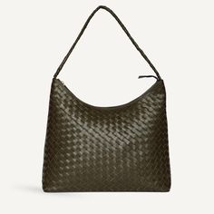 Our bestselling Marni bag in a work-friendly size that holds your laptop. Handwoven carré leather with a smooth bottom panel, braided shoulder strap, and zipper closure. Marries the function of a carryall tote with the style of a fashion bag. Luxury Versatile Woven Leather Hobo Bag, Artisan Woven Leather Tote Shoulder Bag, Eco-friendly Woven Leather Shoulder Bag For Everyday Use, Eco-friendly Woven Leather Shoulder Bag For Shopping, Luxury Eco-friendly Woven Leather Shoulder Bag, Marni Bag, Carryall Tote, Black Houndstooth, Work Bag