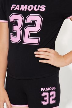 Available In Black/combo. Short Set Short Sleeve With Graphic Contrast Trim Stretch Model Wears Size L XS: (4/5), S: (6/6X), M: (7/8), L: (10/12), XL: (14/16) Mommy & Me Takedown of "Almost Famous Short Set" Disclaimer: Due To The Printing Process A Difference In Saturation May Occur. Each Garment Is Unique. Self/Contrast: 95% Cotton 5% Spandex Imported | Mini Almost Famous Short Set in Black size XS by Fashion Nova Black Graphic Print Playwear Sets, Black Graphic Print Sets For Playwear, Black Summer Playwear Tops, Black Spring Playwear Tops, Stretch Black Tops For Playwear, Black Stretch Tops For Playwear, Black Summer Tops For School, Black Letter Print Playwear Sets, Black Letter Print Sets For Playwear