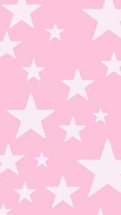 a pink background with white stars on it