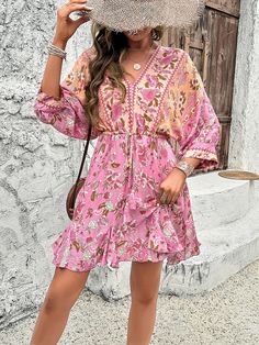 Get ready to boho in style with the Emaline Quarter Sleeve Boho Mini Dress! This dress features quarter sleeves and a relaxed fit perfect for any occasion. Embrace your inner bohemian with this flirty and fun mini dress. Size Guide: Model is 5’8” tall, and has a 33.8” bust, 24.2” waist, & 35.7” hips. She is wearing a S / US 4 / AU 8. This dress is true to size. Material: 100% Cotton Feature: V-neckline. Quarter sleeves. Boho pattern detailing. Waist adjustable tie. Mini length. Relaxed fit. Care Instructions: Machine wash / Cold hand wash