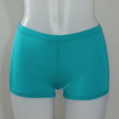 "SHINY SPANDEX BOOTY SHORTS 70 Amazing Colors to Choose From! All Sizes Available SIZING Sizing Chart in Photos If you need help with sizing, please send a message with your measurements (Waist, Hips, Thigh). If you need something larger than a 5X just let me know! CUSTOM ITEMS We are able to make changes to this item including: Inseam shorter/longer Waist higher/lower Matching top also available LEOTARDS: Long Sleeve, Short Sleeve, Tank, Halter Neck, High Neck, Scoop Neck, Low back, Camisole, Two Tone, One Shoulder, Gymnastic, Keyhole, Mens SHORTS: Booty Shorts, Spankies, Low Rise, High Waist, High Cut Legs, Briefs, Mens TOPS: Bra Top, Tank Top, Halter Top, Camisole Top, High Neck, Short/Long Sleeve BOTTOMS: Capris, Leggings, High Waist, Low Rise, Athletic Shorts, 2\" to 8\" inseam BODY W Basic Sports Bottoms Short Length, Basic Sports Shorts, Basic Sport Shorts, Basic Fitted High-waisted Shorts, Basic Stretch Short Bottoms, Short Bottoms For Cheerleading, Basic Bottoms With Built-in Shorts And Stretch, Fitted Shorts For Beach, Basic Shorts With Short Inseam