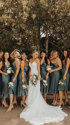 a group of bridesmaids posing for a photo