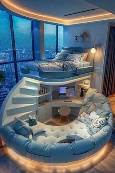 a bed room with a couch and a desk in the corner next to a window