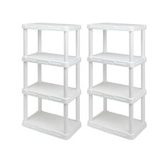 two white shelves sitting next to each other