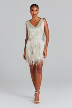 Sadie Silver Dress Women's Clothing > Dresses.     DESCRIPTION &  FEATURES  The SADIE SILVER is a real showstopper. I ndividually hand embellished with crystal waterfall beading, to  create a mesmerising illusion. A sachet of silver beaded fringing and sequins with flat beaded panelling on the waist to accentuate your curves and flatter your figure.  This eye catching mini is the perfect party dress or the ideal celebration dress for the bride to be.   -Hand embellished  -Flat sequin and beaded Sadie Dress, Celebration Dress, Nadine Merabi, Sadies Dress, Silver Mini Dress, Embellished Flats, Fabulous Dresses, Beaded Fringe, Silver Dress