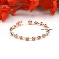 925 Silver Multi Color Bracelet, Gold Plated Multi Color Bracelet, Silver Multi Color Lock Bracelet, Doug Paulus DP Multi Gemstone ♦️ ITEM     D E T A I L S ♦️ ✦ Name :  Multi Color Bracelet ✦ Metal : 925 Silver ✦ Size : Select the Variations ✦ Side Stone : Cubic Zircon ✦ Big Stone : Multi Sapphire                                                                                SIXTH SENSE JEWELS ✦ Our all design are made to order. We need 6 to 8 days for making and delivery to depend on the shipping method you select. ✦Product & gemstone weight may vary from actual products. ✦All are designed and handmade in-house by me and team with precision, Perfect craftsmanship and strong interest! ✦We are continuously listing new products in our store. So keep coming back to see more great updates in Tennis Bracelet With Gemstone Accents As Gift, Gift Tennis Bracelet With Gemstone Accents, Multicolor Bangle Bracelets For Anniversary, Wedding Bracelets With Gemstone Accents, Fine Jewelry Multi-stone Bracelet As Gift, Fine Jewelry Multi-stone Bracelets For Gifts, Multi-stone Diamond Bangle Bracelet Gift, Luxury Multi-stone Bracelets As Gift, Fine Jewelry Multicolor Wedding Bracelet