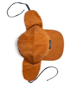 This warm and stylish Corduroy Trapper Hat features warm sherpa ear flaps for added comfort and protection during outdoor activities. Its 5 panel design makes it a stylish choice and adjustable strap provides comfort and functionality. Perfect for camping, hiking, and more. Made with high quality materials for superior durability. Sizing: Runs small. Adult - One size fits most Adjustable Brown Hat With Fleece Lining, Adjustable Fleece-lined Hat With Ear Flaps, Adjustable Hats With Fleece Lining And Ear Flaps, Adjustable Winter Adventure Hat, Brown Hats With Ear Flaps For Outdoor Activities, Brown Hats With Ear Flaps For Outdoors, Adjustable Fleece-lined Hat For Outdoor, Brown Corduroy Hat For Outdoor, Outdoor Hats With Adjustable Ear Flaps