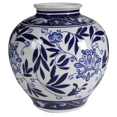 a large blue and white vase with flowers on the bottom is sitting in front of a white background